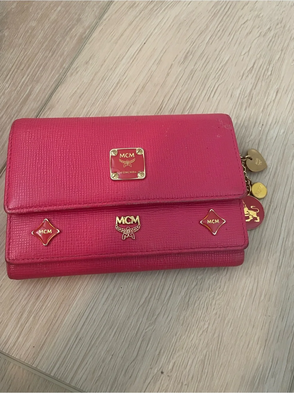 MCM Pink Leather Continental Wallet with Charm Accents & Gold Hardware”